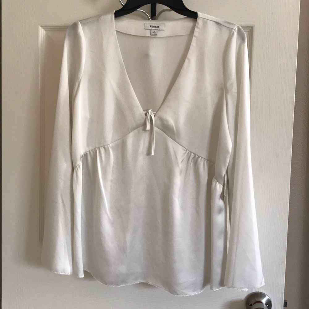 Pearl long sleeve blouse.
